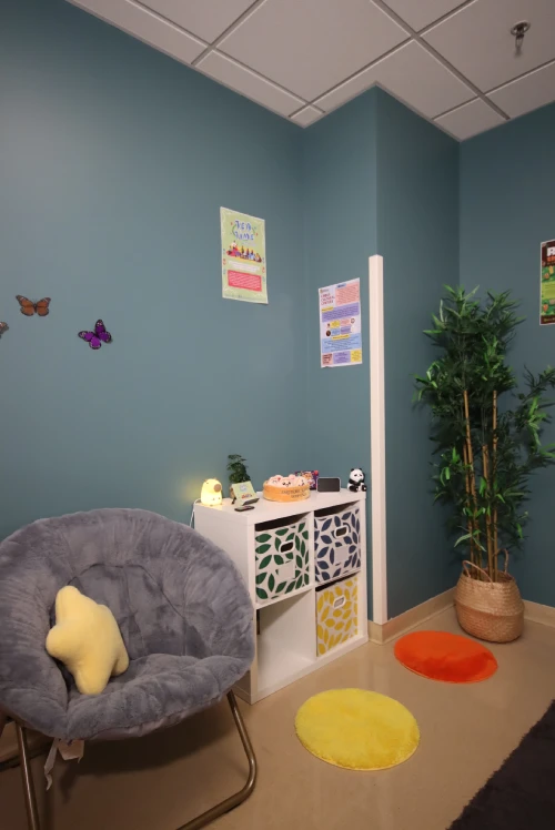 sensory room with calming lighting and seating