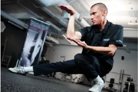 students performing floor exercises